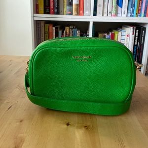 One Kate Spade, green cross body leather bag. Never used, but not new with tags.